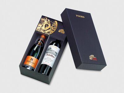 Caja regalo Bodegas Pinord a domicilio: botella de cava, botella de tinto y chocolates