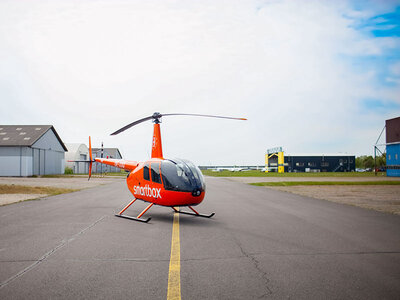 Boks Helikopterpilot for en dag med Helicompany