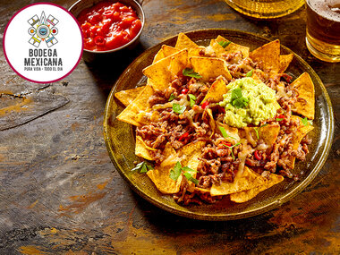 Insieme da Bodega Mexicana: nachos e fajitas con bibite per 2