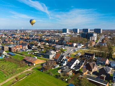 Zweven boven Wachtebeke in een heteluchtballon voor 2